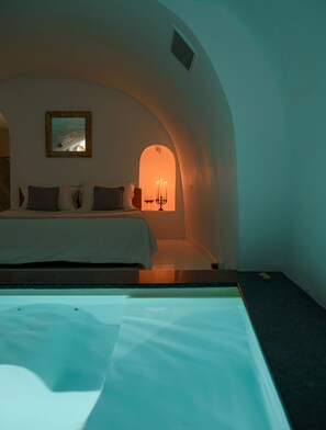 Honeymoon Cave Suite with 2 Hot Tubs (Caldera View) | Premium bedding, in-room safe, soundproofing, iron/ironing board - Zenith Blue Traditional Houses (Santorini)