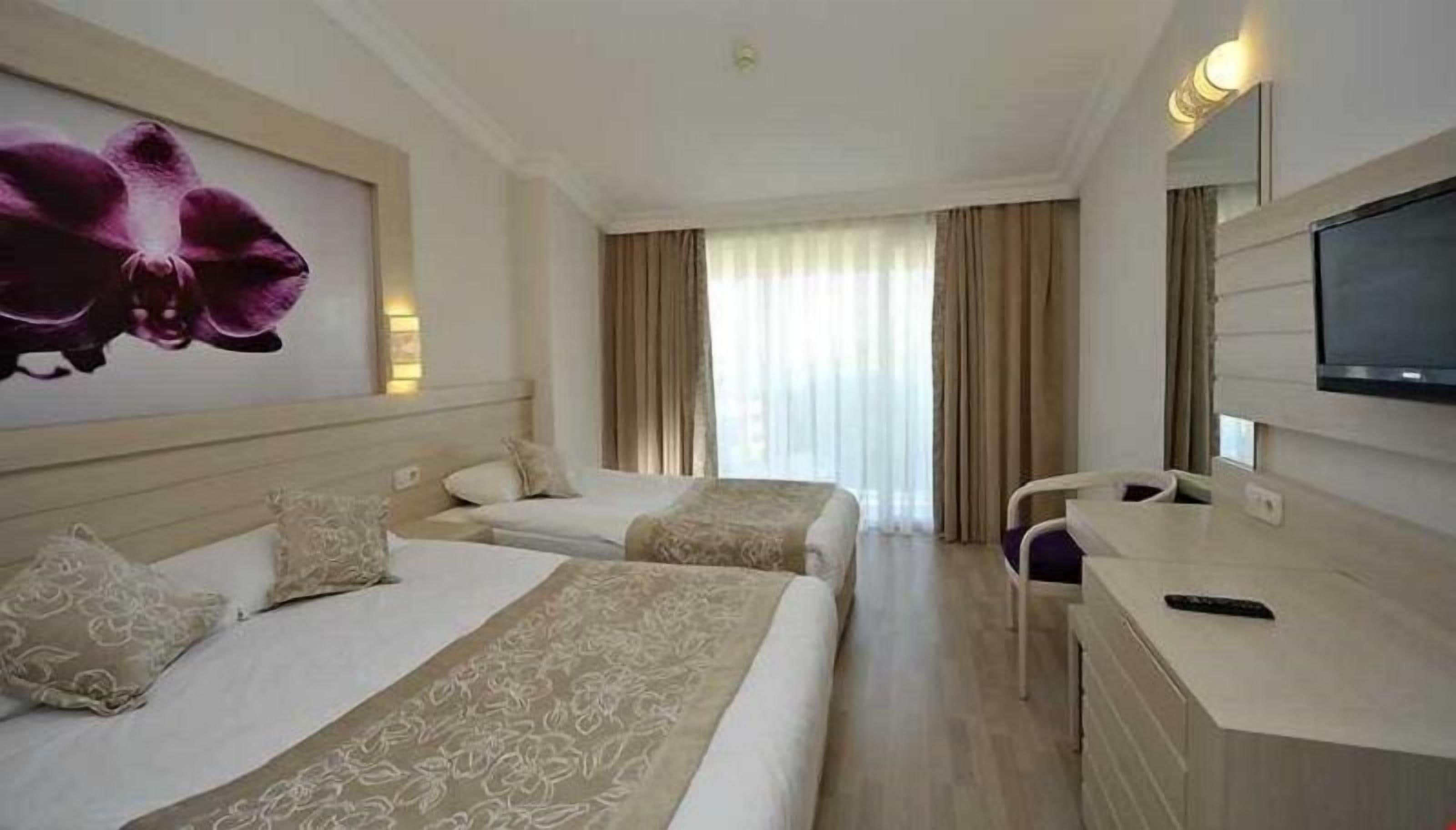 Minibar, desk, blackout drapes, soundproofing