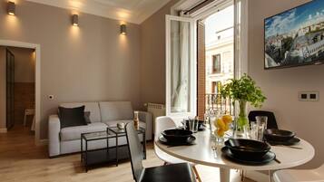 Appartement, 1 slaapkamer, uitzicht op stad | Verduisterende gordijnen, geluiddichte muren, gratis wifi, beddengoed