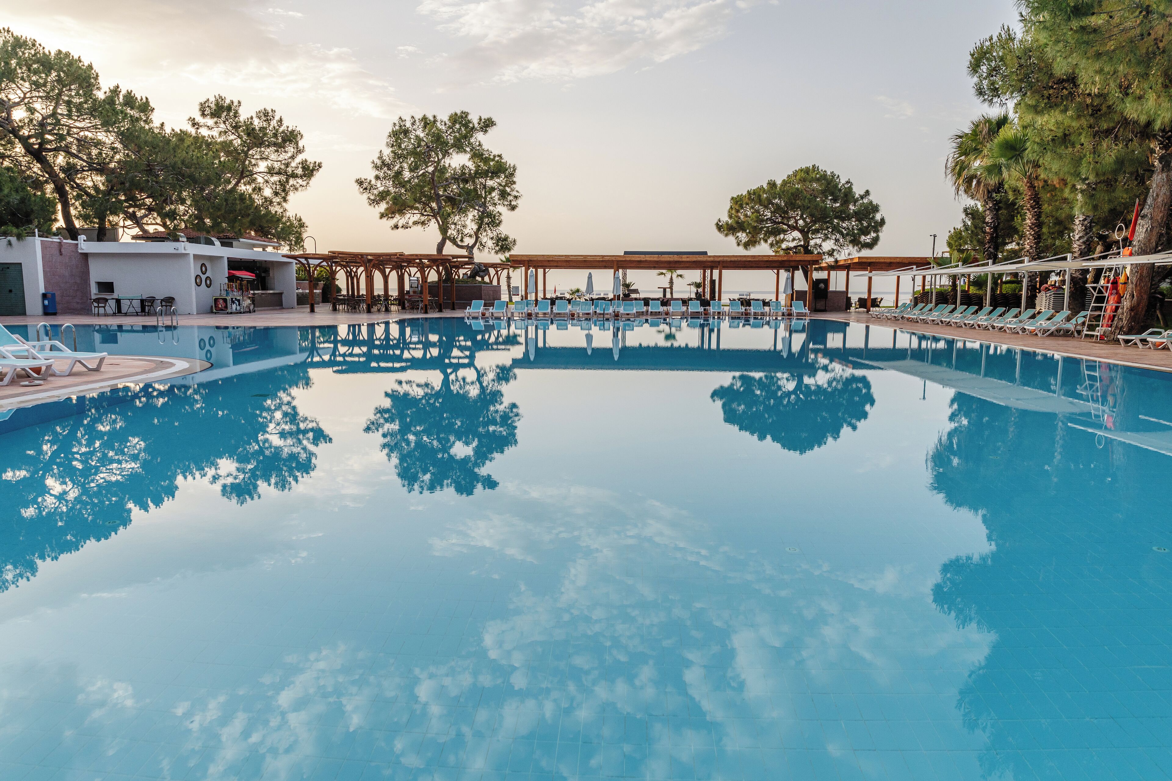 Seasonal outdoor pool, pool umbrellas, pool loungers