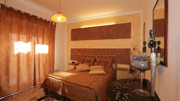 Frette Italian sheets, premium bedding, down comforters, minibar