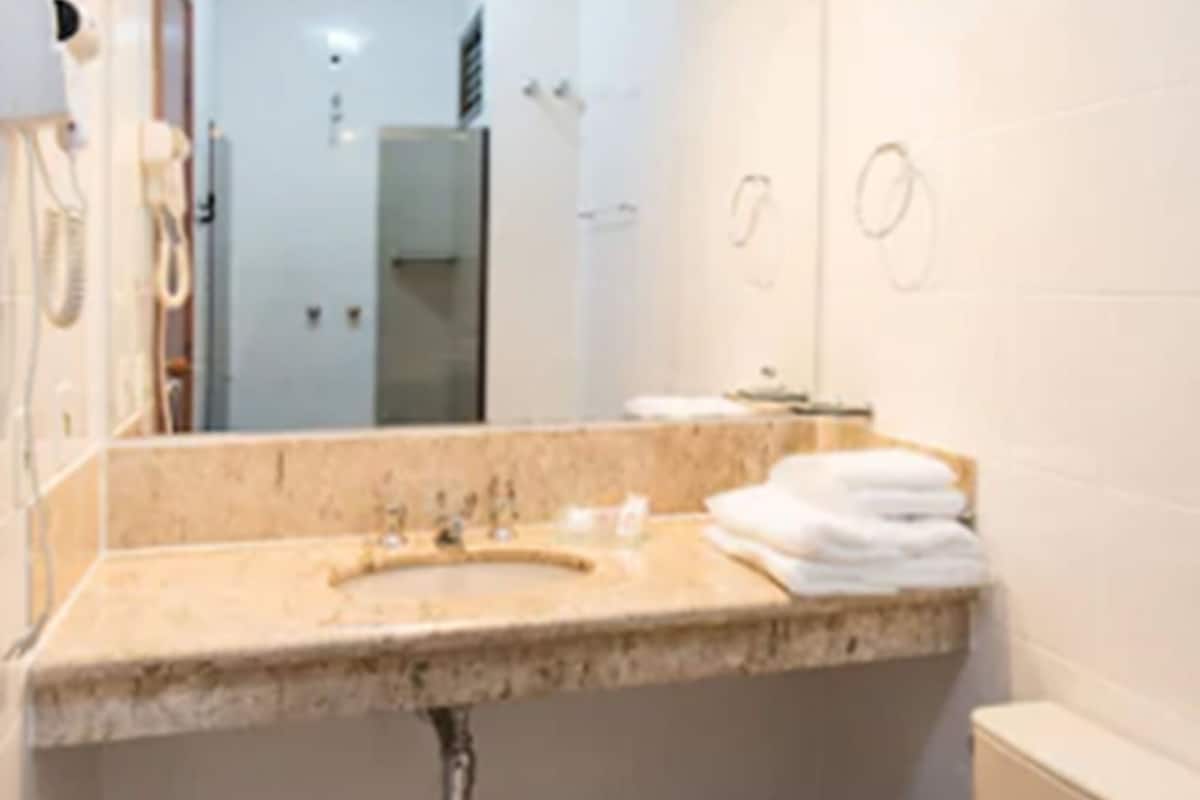 shower, free toiletries, hair dryer, towels