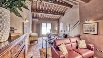 Deluxe Suite, Terrace | Living area | Flat-screen TV, toys