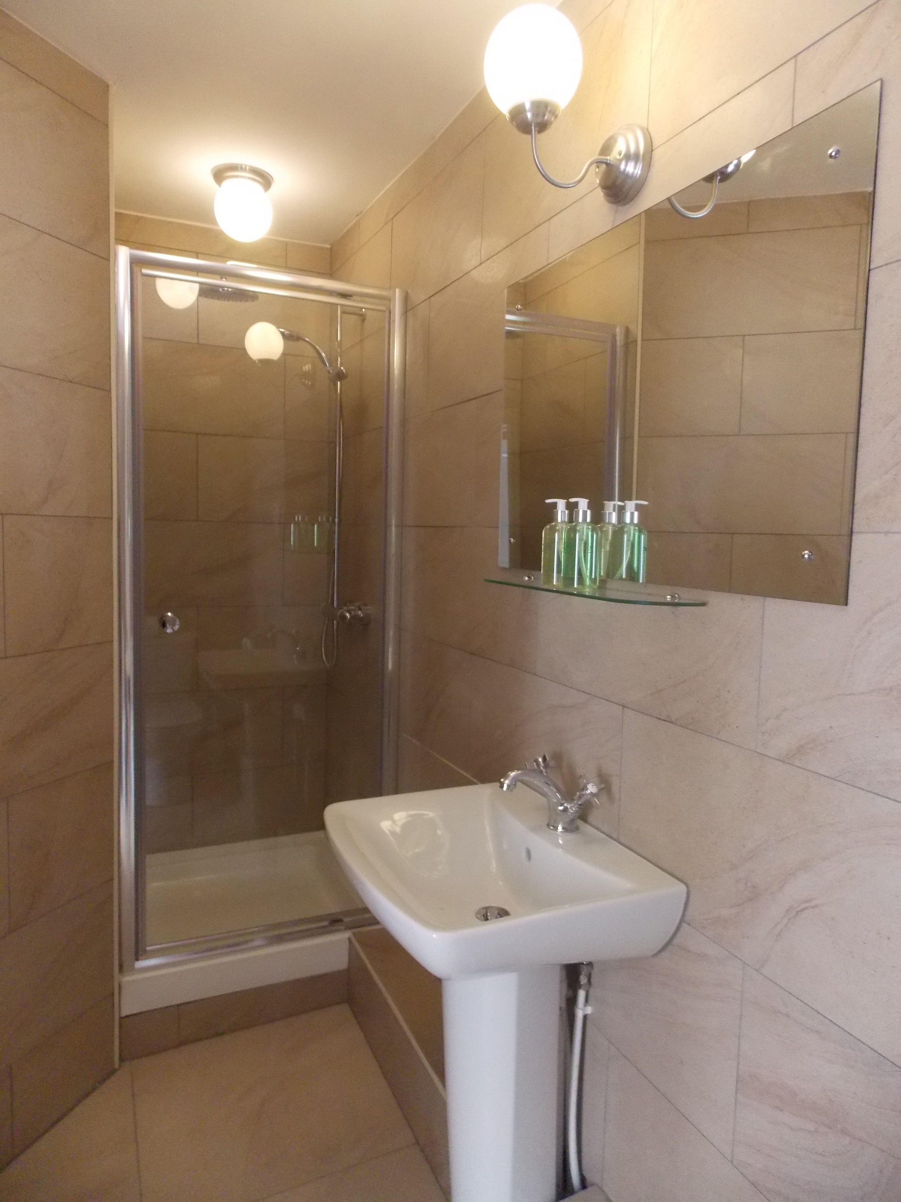 shower, free toiletries, hair dryer, towels