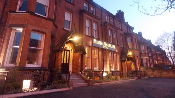 A traditional brick building with a sign for 'The Mountford Hotel'. - The Mountford Hotel - Free Parking (Liverpool)