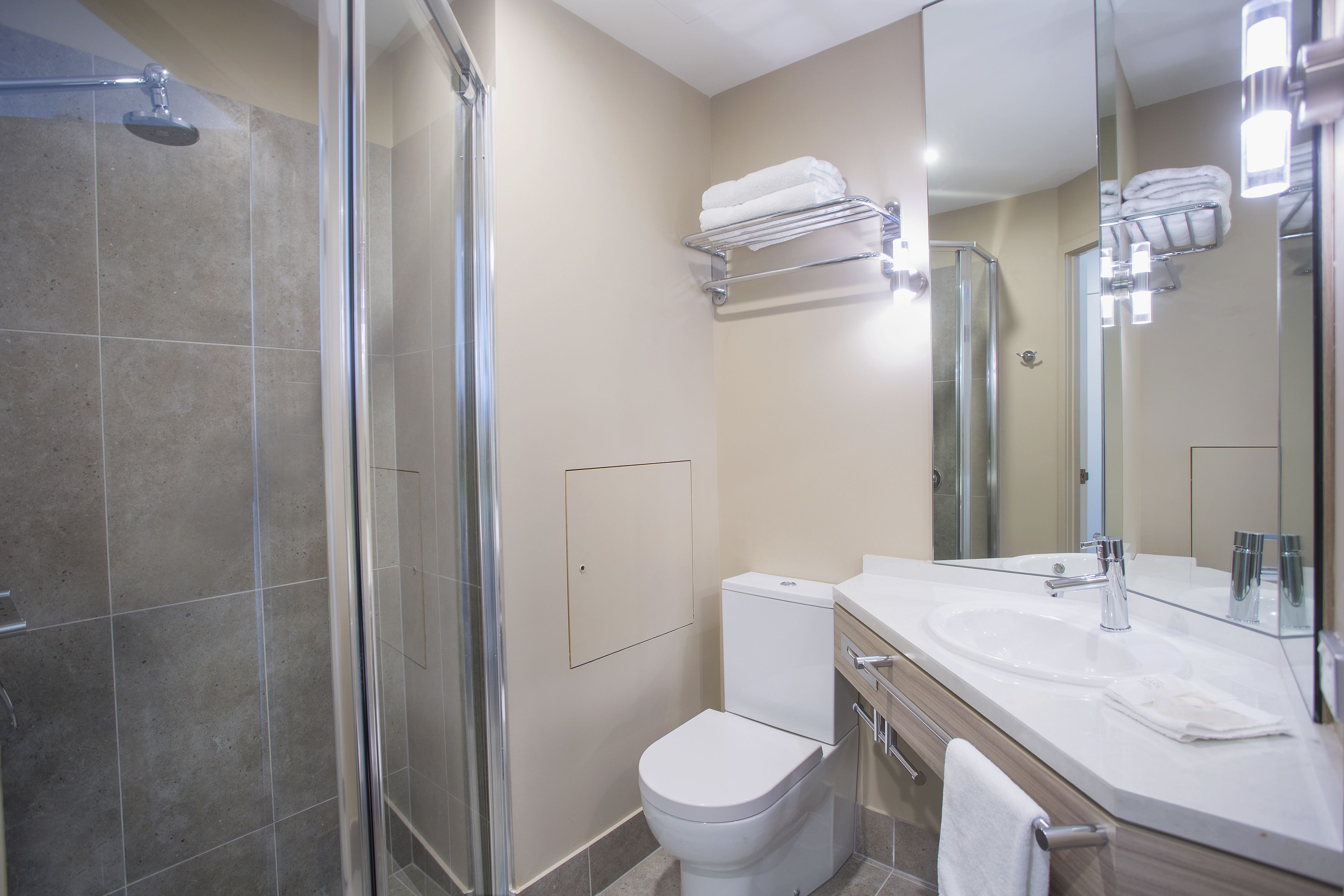 shower, eco-friendly toiletries, hair dryer, towels