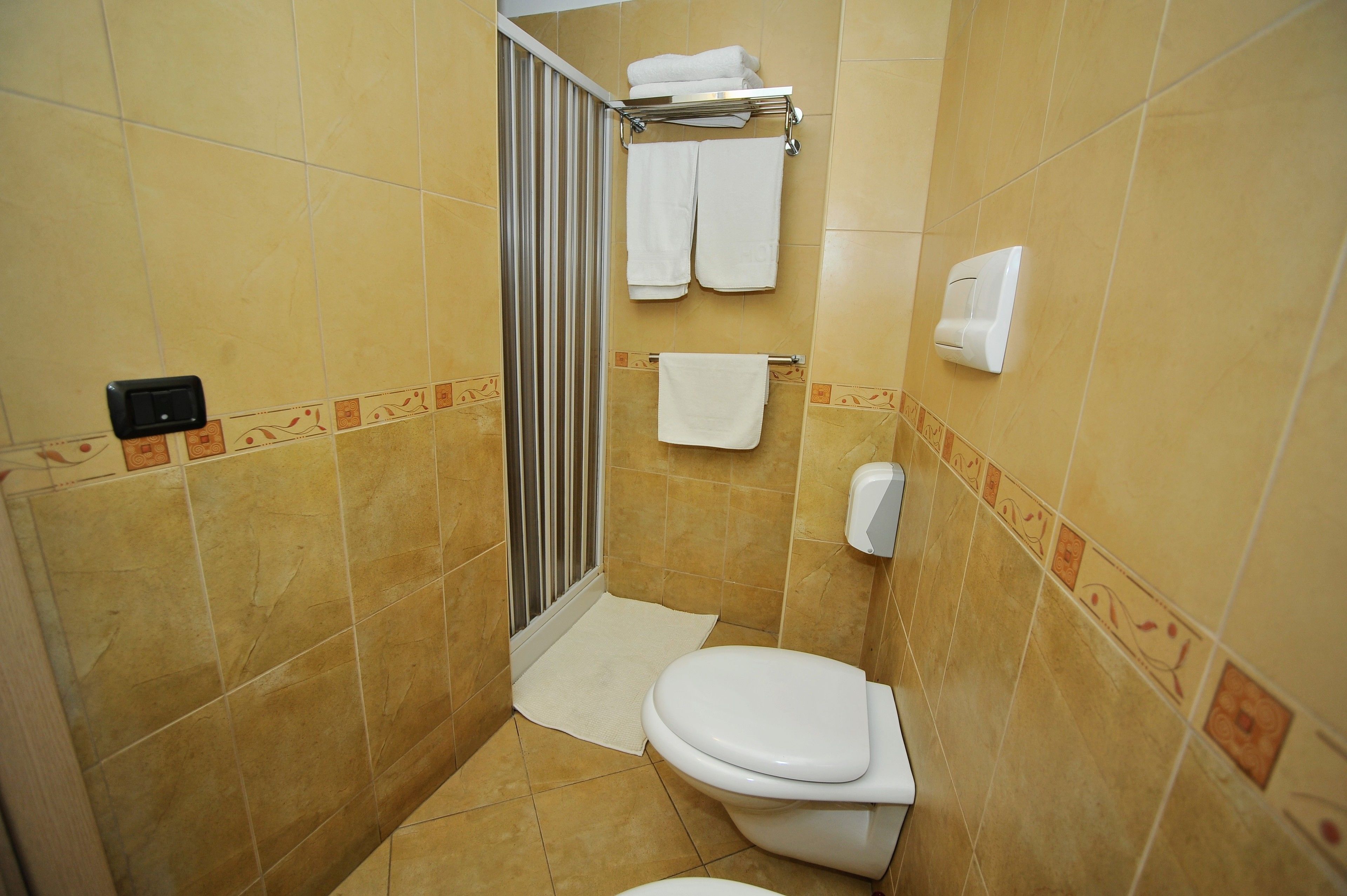 basic twin room, 1 bedroom, ensuite, city view | bathroom | shower, free toiletries, hair dryer, towels