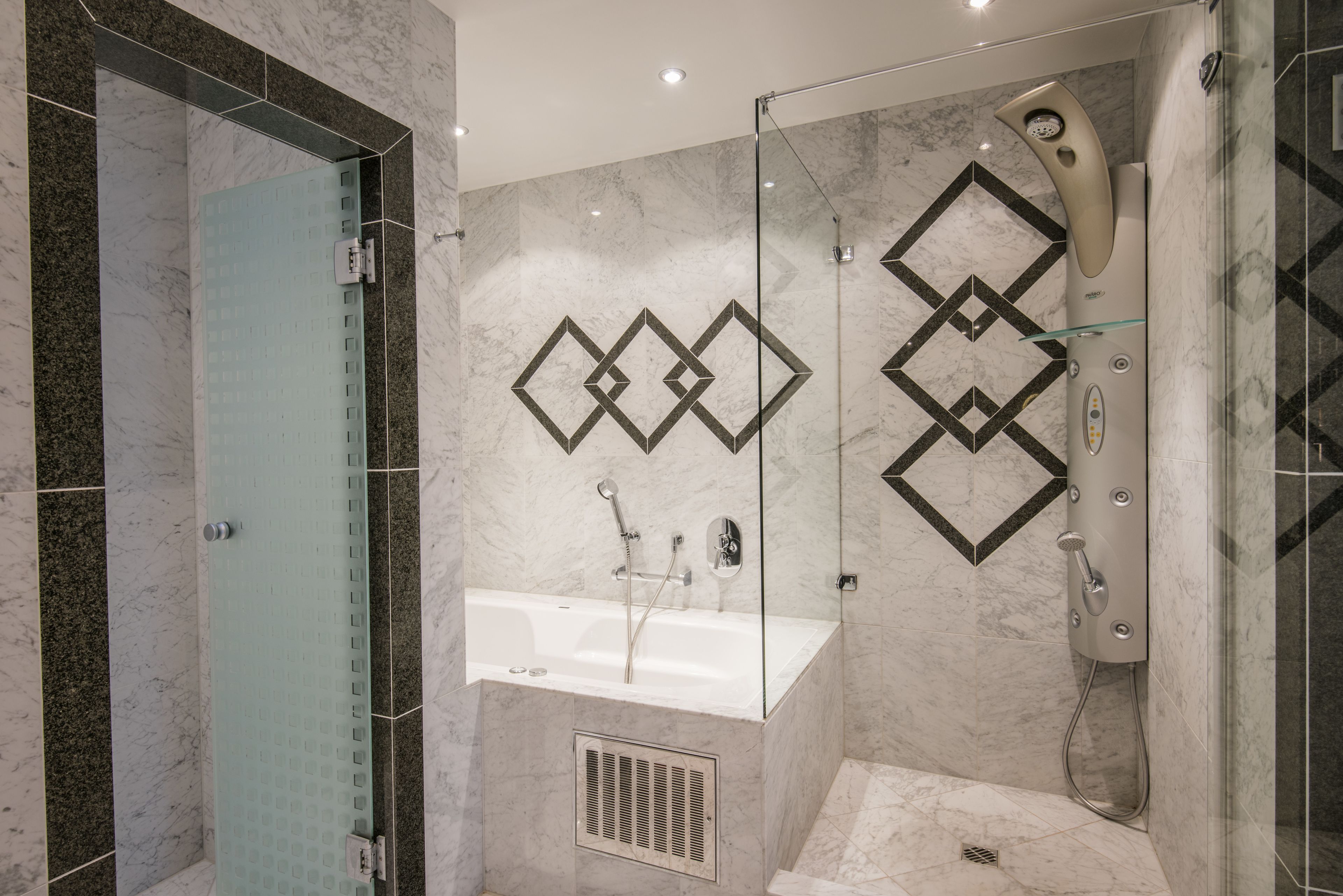 junior suite, 1 king bed, lake view | bathroom | shower, hair dryer, bathrobes, slippers