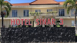 A hotel sign with "HOTEL SINAR 3" in large letters. - Hotel Sinar 3 (Sidoarjo)