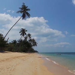 Na praia, toalhas de praia