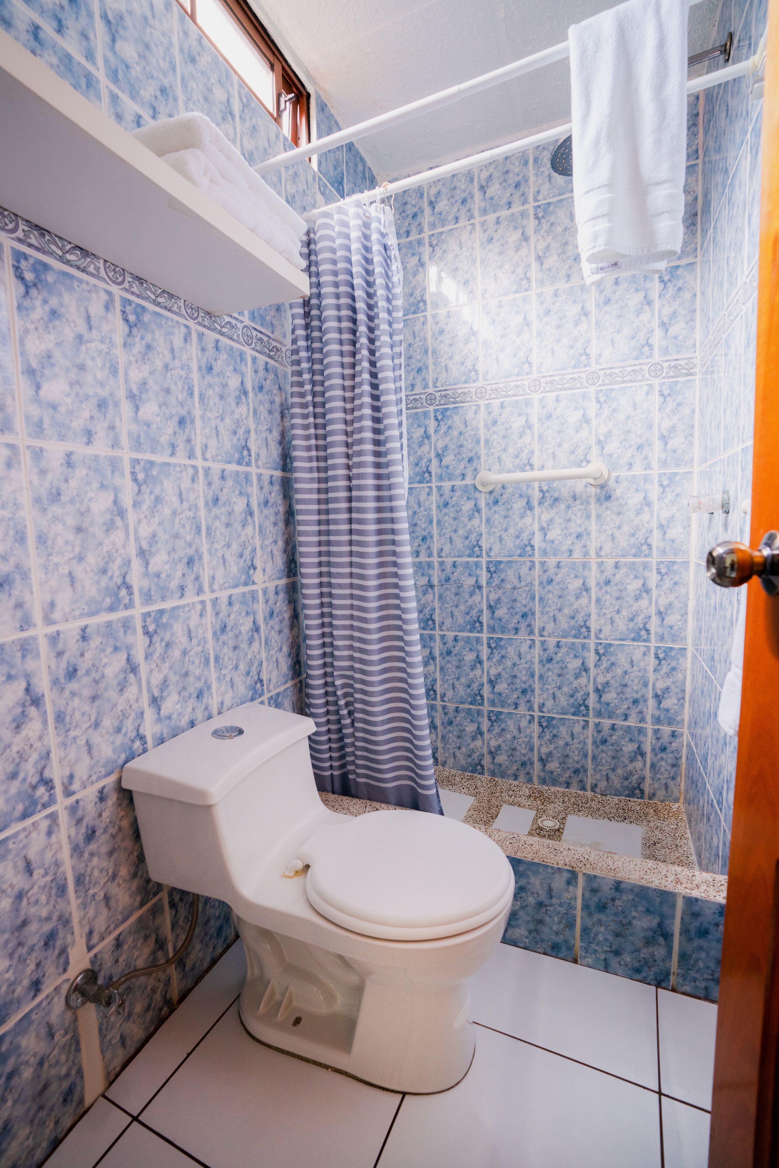 standard room | bathroom | hair dryer, towels, soap, shampoo