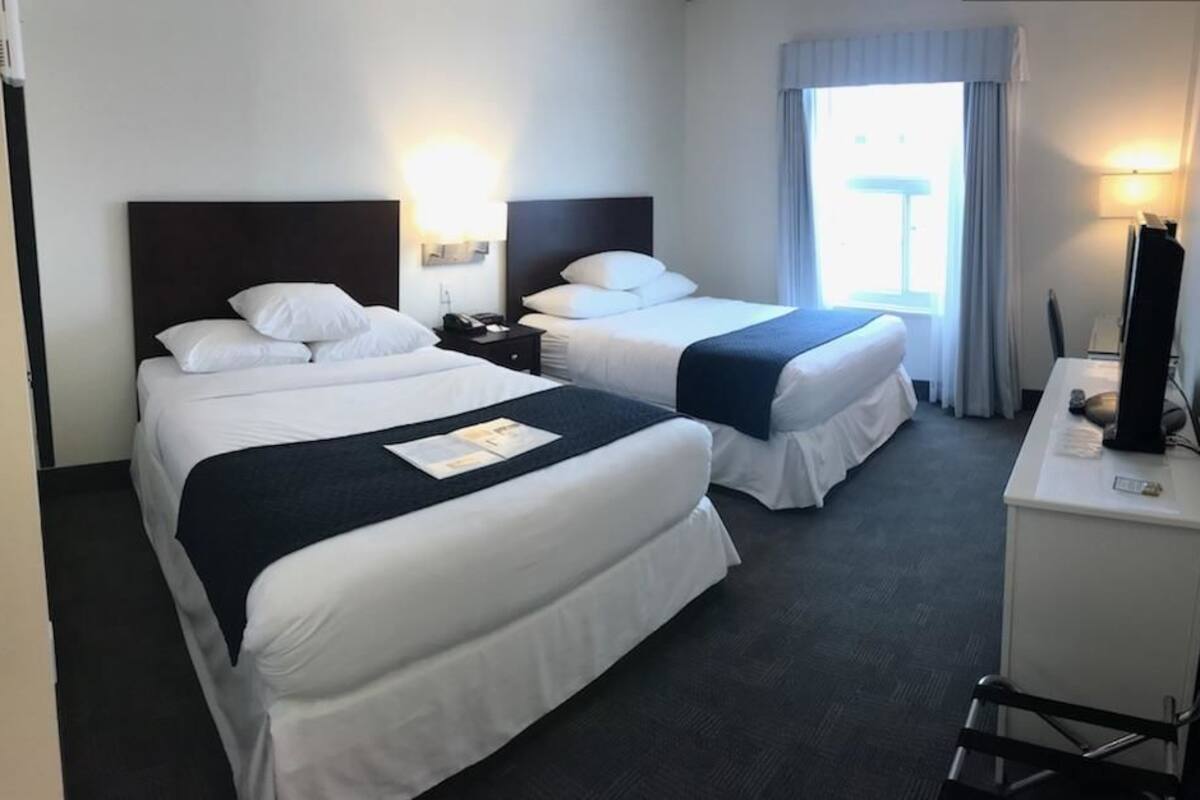 Premium Room, 2 Queen Beds | Desk, iron/ironing board, free WiFi