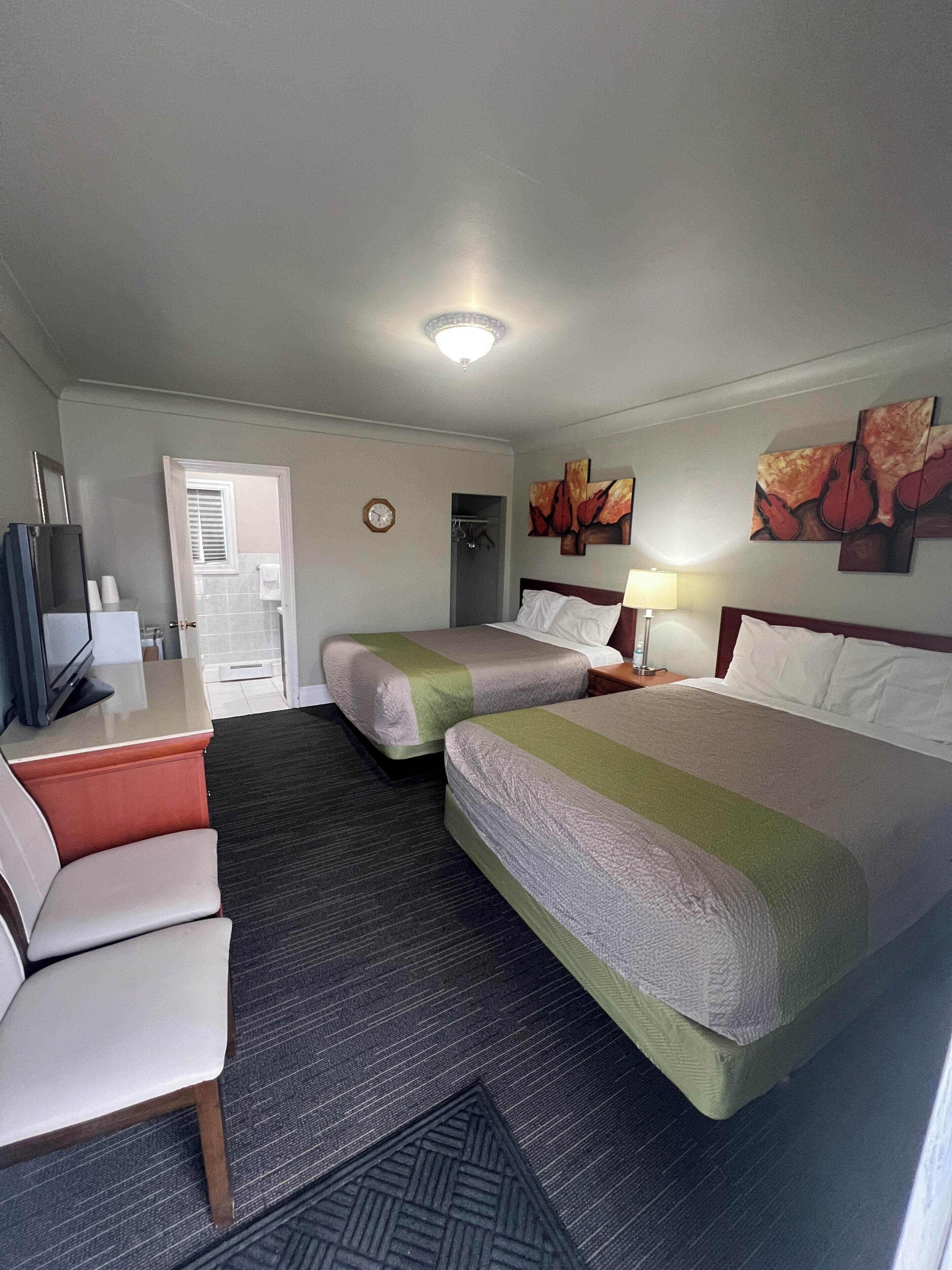 Quarto premier, 2 camas de casal, para não fumantes | Escrivaninha, Wi-Fi de cortesia