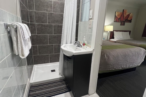 Premier Room, 2 Queen Beds, Non Smoking | Bathroom | Free toiletries, hair dryer, towels