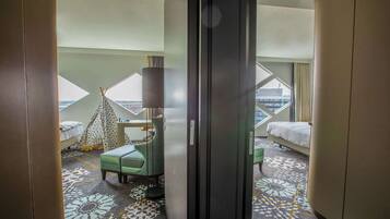 Family Room (Connecting Rooms) | Living area | 42-inch TV with cable channels, toys