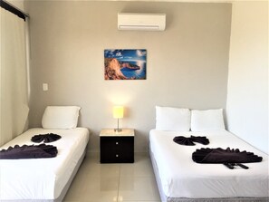 Estandar Triple Sin Balcón | In-room safe, laptop workspace, free WiFi - Coral Blue Beach Condo (Playa del Carmen)