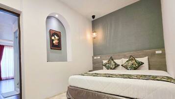 Premium Double Room | Living area | 46-inch LED TV with cable channels, TV