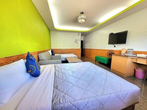 Family Quadruple Room, 1 Bedroom, Mountain View | Blackout drapes, soundproofing, free WiFi, bed sheets - Xing Ji Hotel (Hengchun)