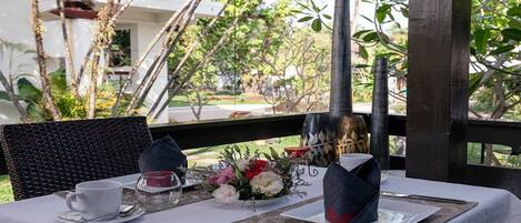 Breakfast, lunch served; local and international cuisine, garden views