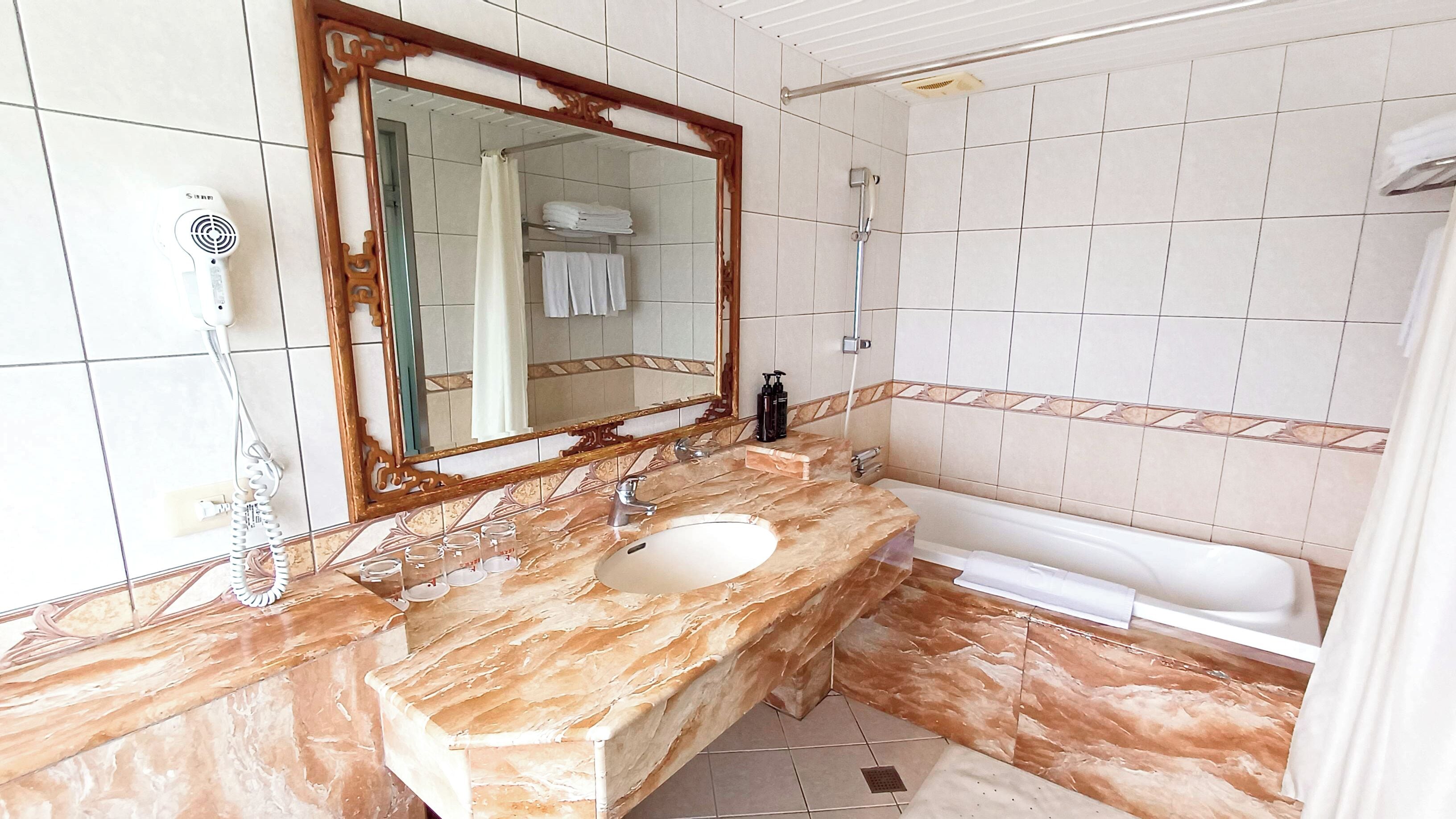 classic quadruple room | bathroom | free toiletries, hair dryer, slippers, towels