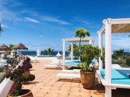 Outdoor pool, open 10:00 AM to 6:00 PM, free cabanas, pool umbrellas