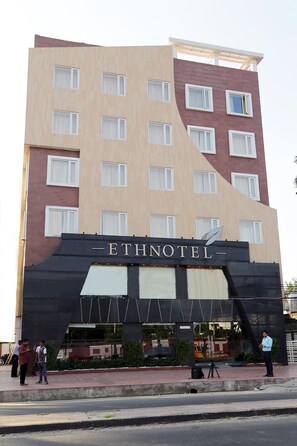 A multi-story building with a sign reading "ETHNOTEL". - Ethnotel, Kolkata Airport (Barakpur)