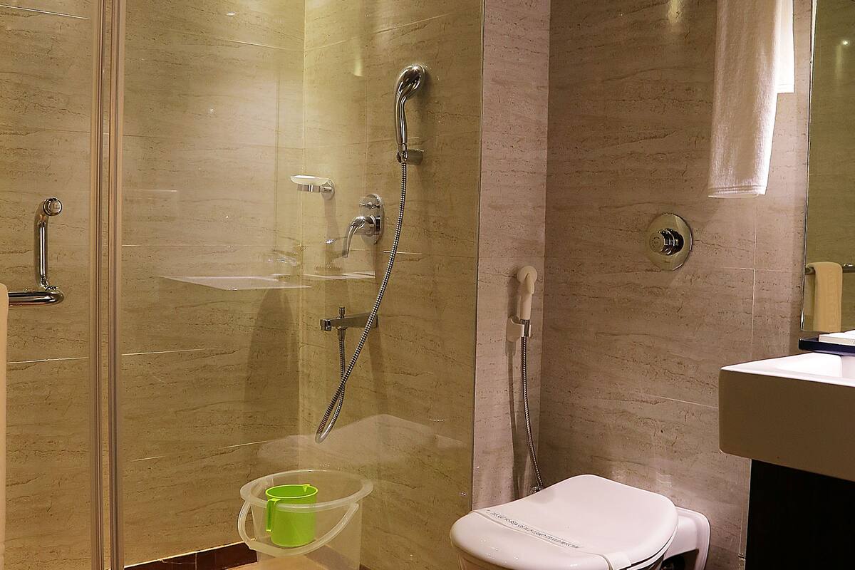 elita room | bathroom | shower, free toiletries, hair dryer, slippers