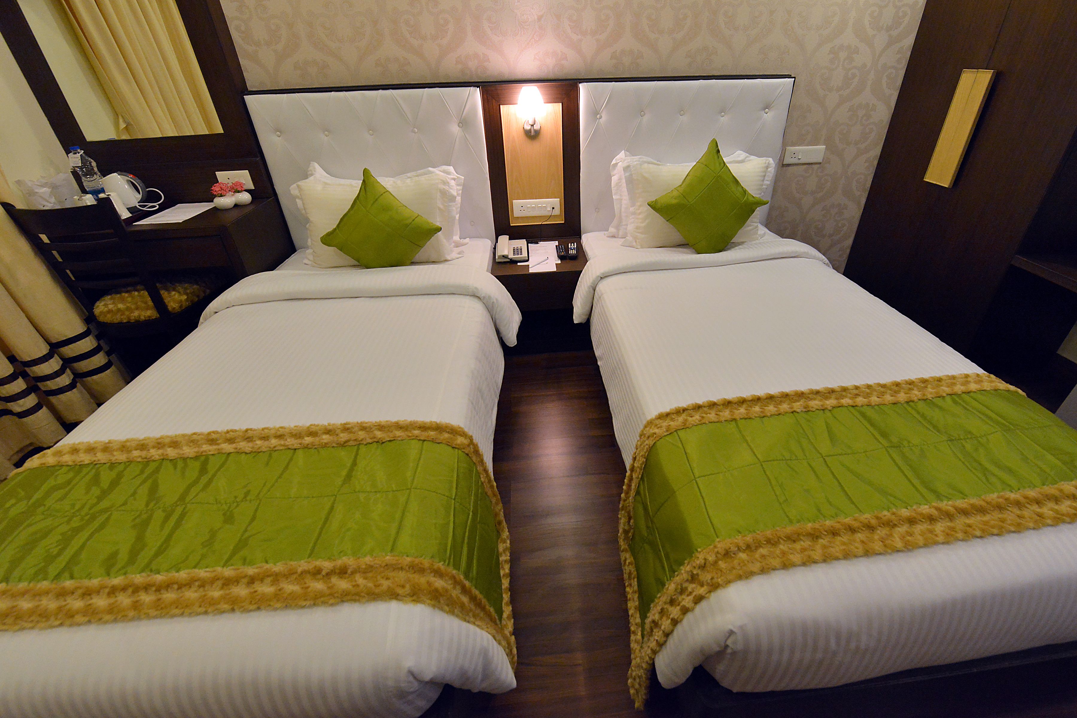 elita room  | minibar, desk, iron/ironing board, rollaway beds