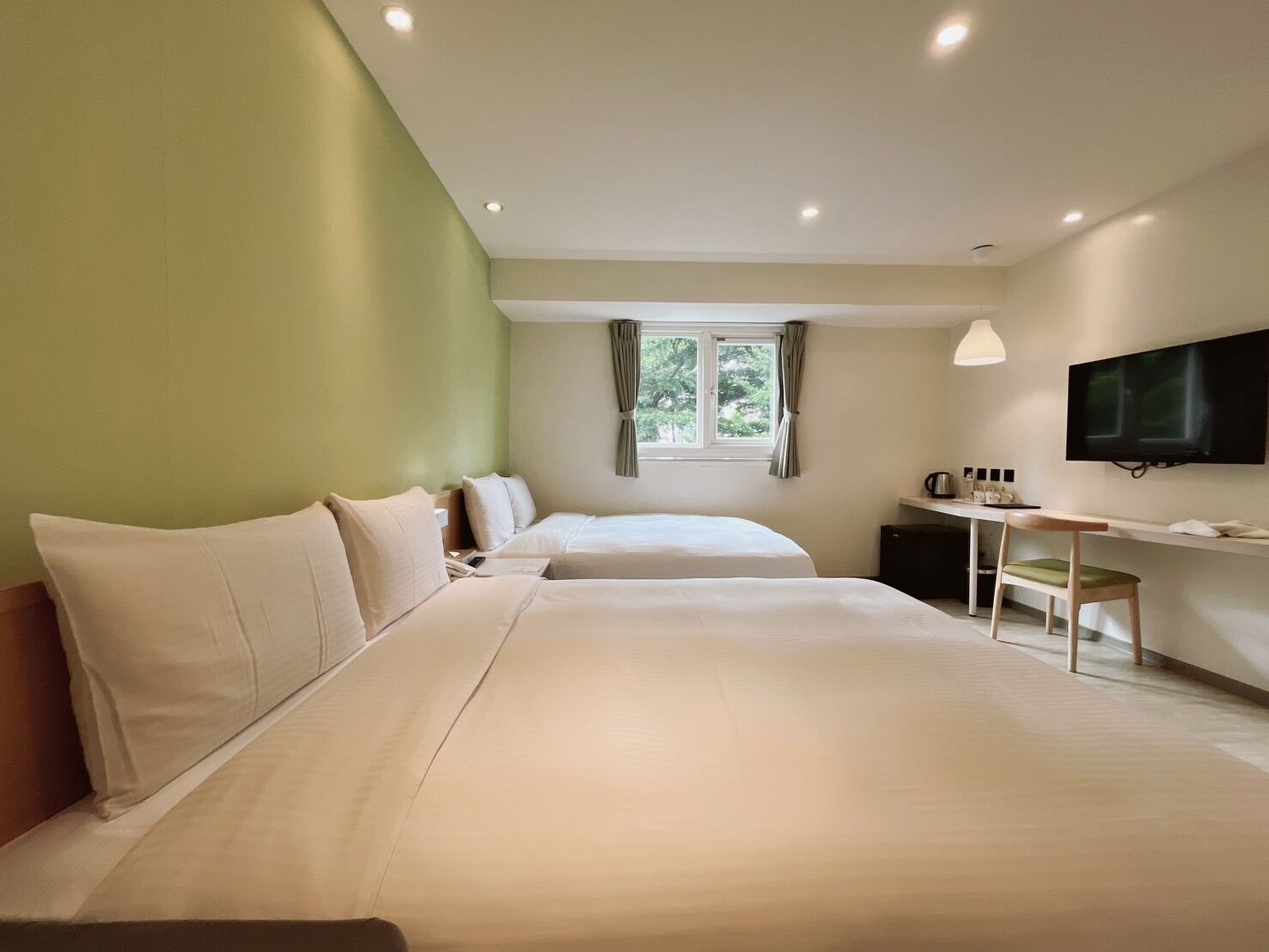 Down duvets, desk, blackout curtains, soundproofing