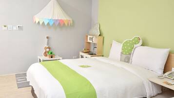 Family Room | Down comforters, desk, blackout drapes, soundproofing