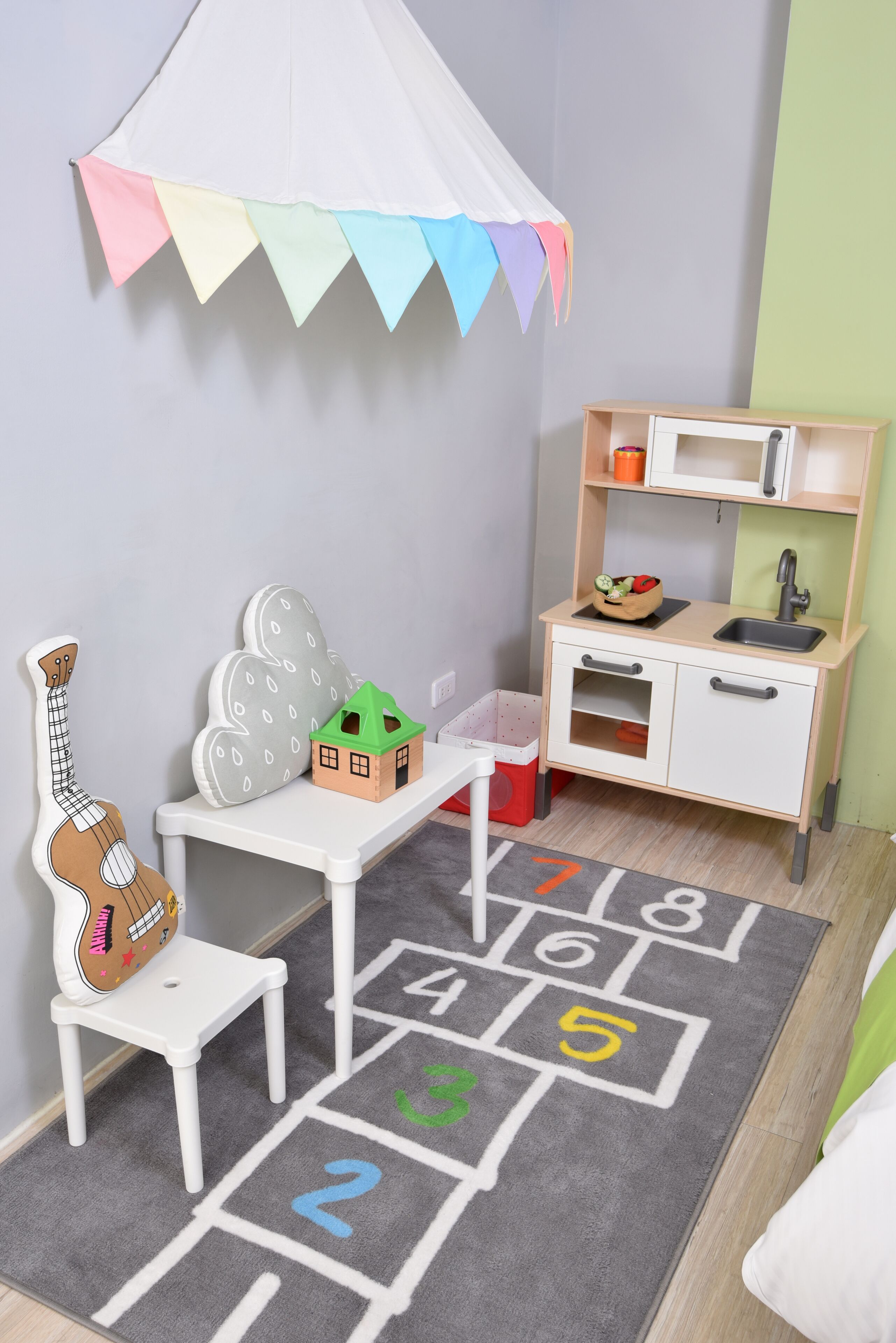 family room | down duvets, desk, blackout curtains, soundproofing