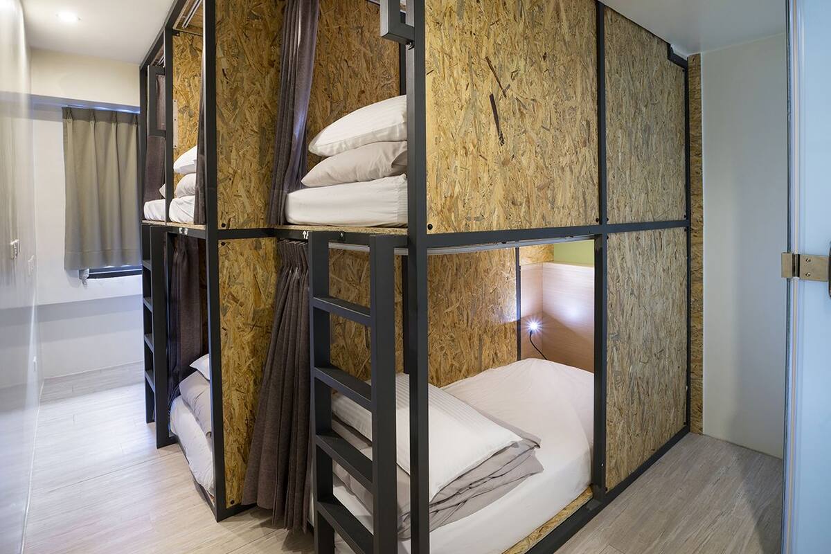 Down comforters, desk, blackout drapes, soundproofing