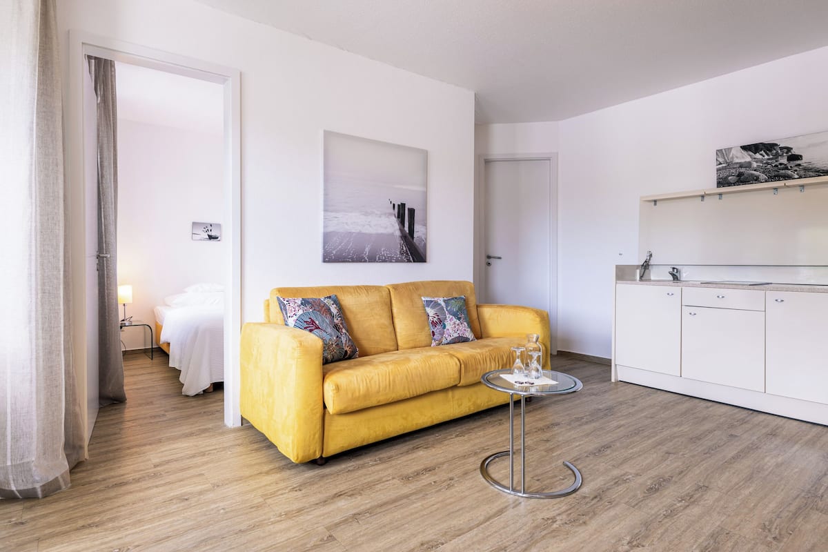 Panoramic Apartment, Balcony | 1 bedroom, premium bedding, in-room safe, individually decorated
