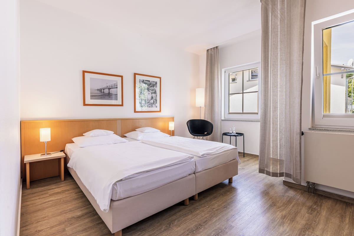 Premium bedding, in-room safe, desk, soundproofing