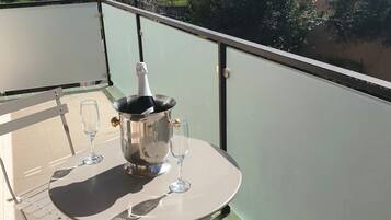 Suíte júnior, 1 cama de casal, banheira de imersão | Sacada