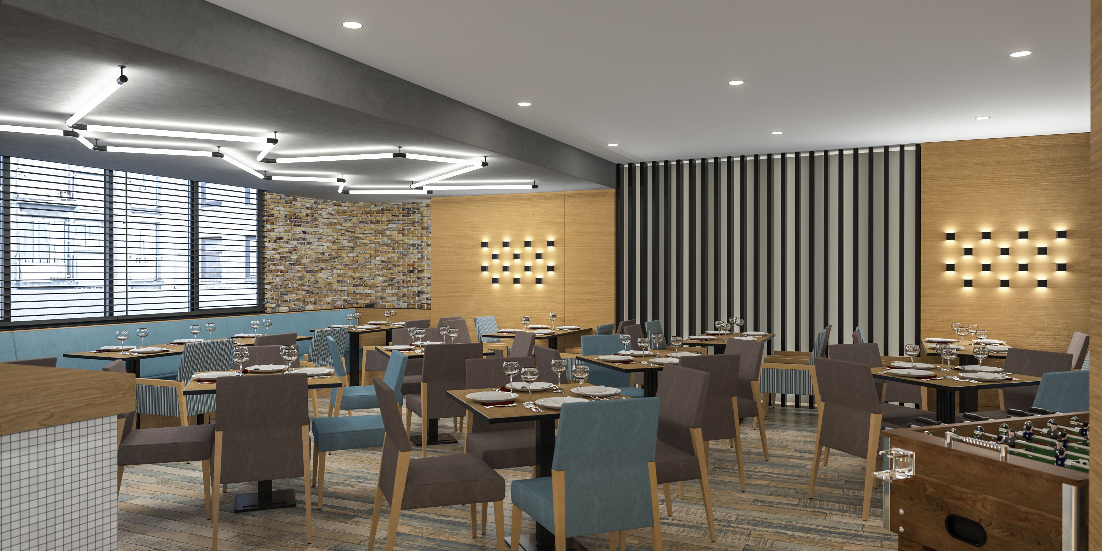 Un comedor moderno con mesas, sillas e iluminación ambiental.