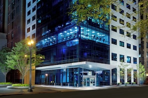 A modern hotel with a glass facade, multiple floors, and a visible entrance. - Hyatt Place Chicago/Downtown - The Loop (Chicago)