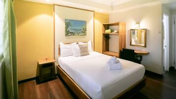 Desk, laptop workspace, free WiFi, bed sheets