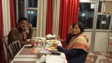 Breakfast, lunch, dinner served; local cuisine