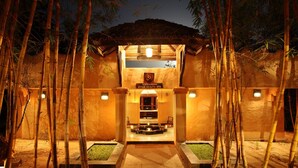 A well-lit entrance to a spa with a sign reading "Visramam Ayur Health Spa". - Tuli Tiger Resort (Bichhiya)