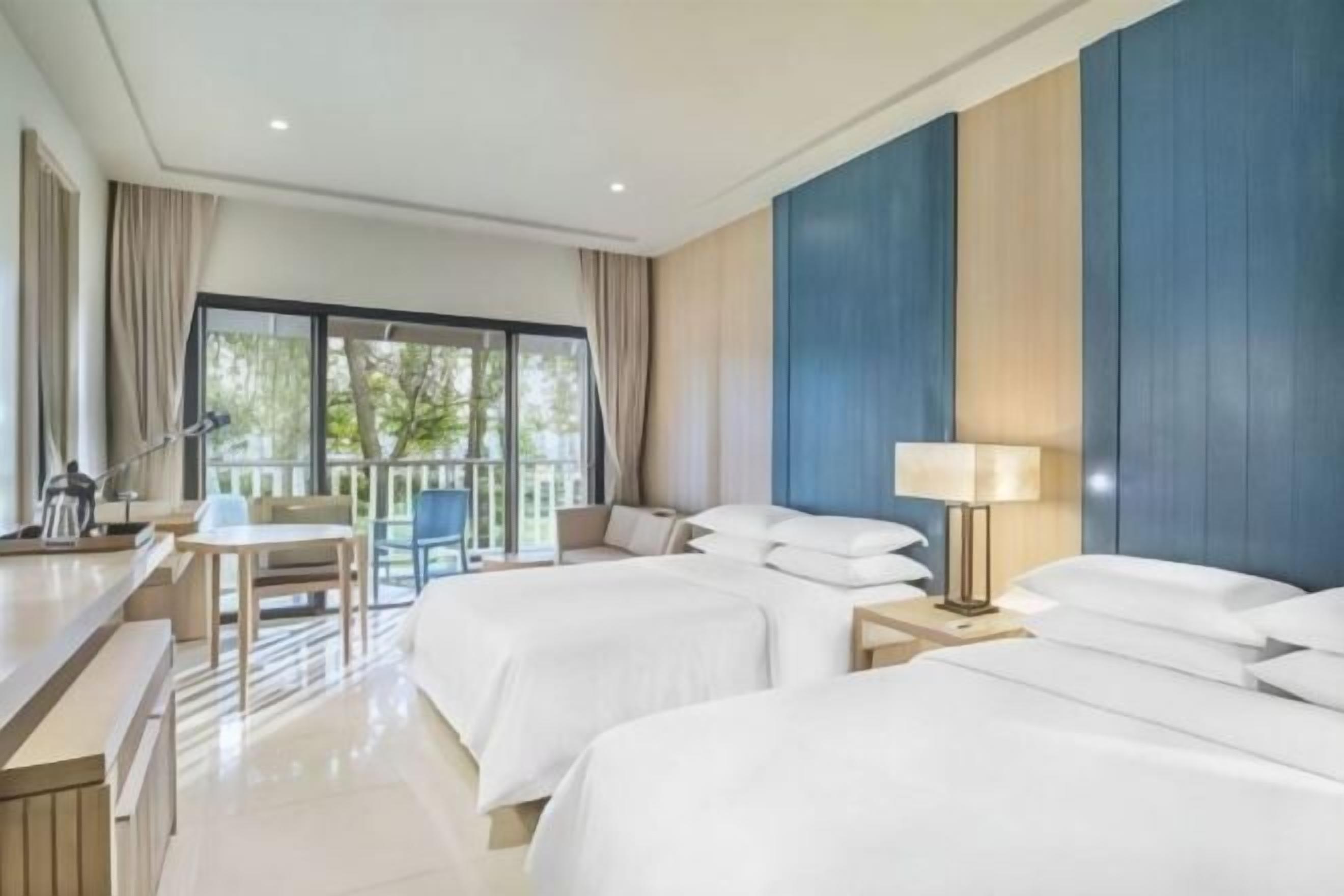 Hypo-allergenic bedding, pillowtop beds, in-room safe, desk