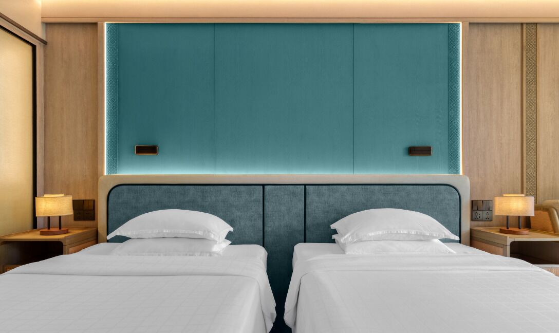 Hypo-allergenic bedding, pillow-top beds, in-room safe, desk