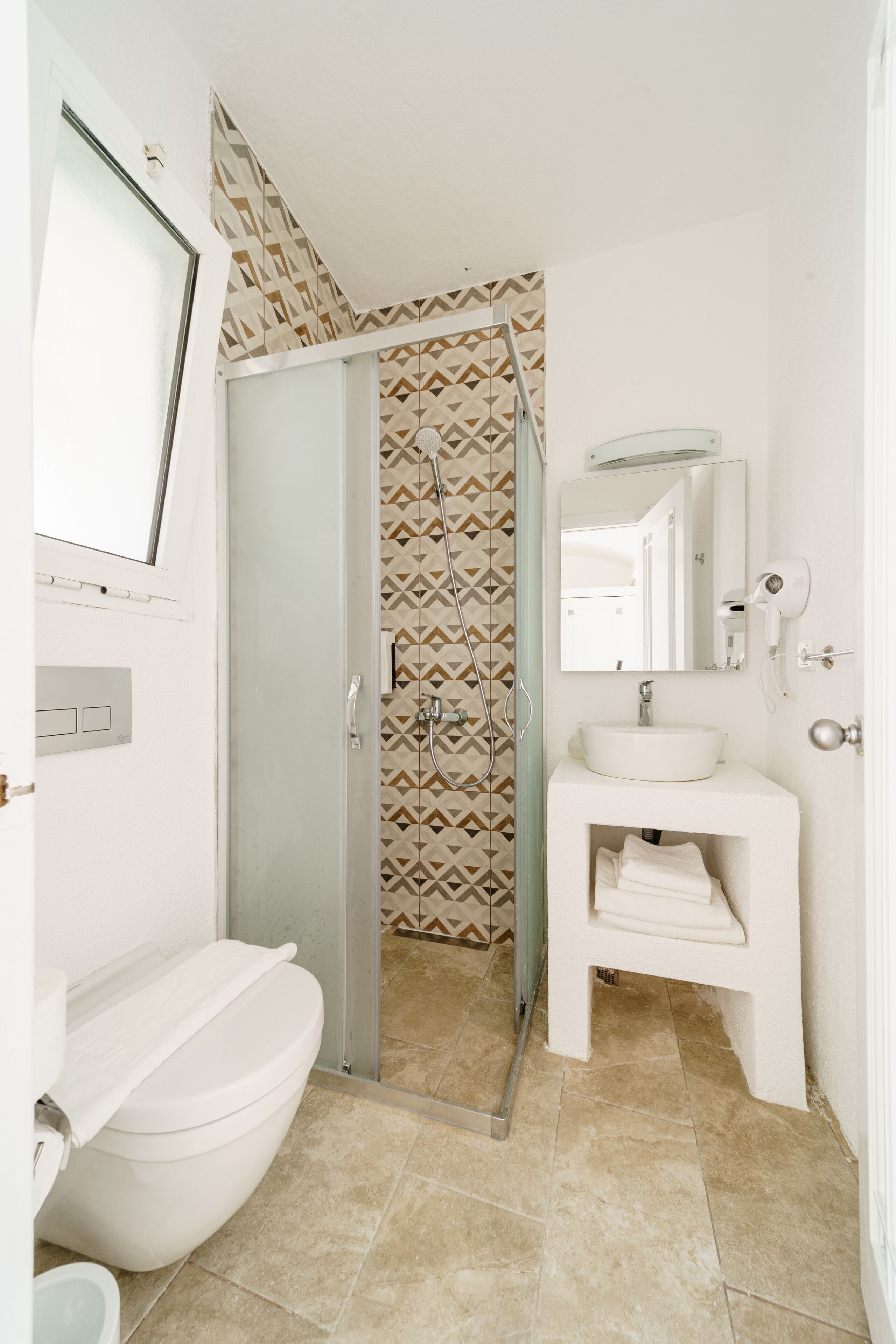 superior double room | bathroom | shower, free toiletries, hair dryer, towels