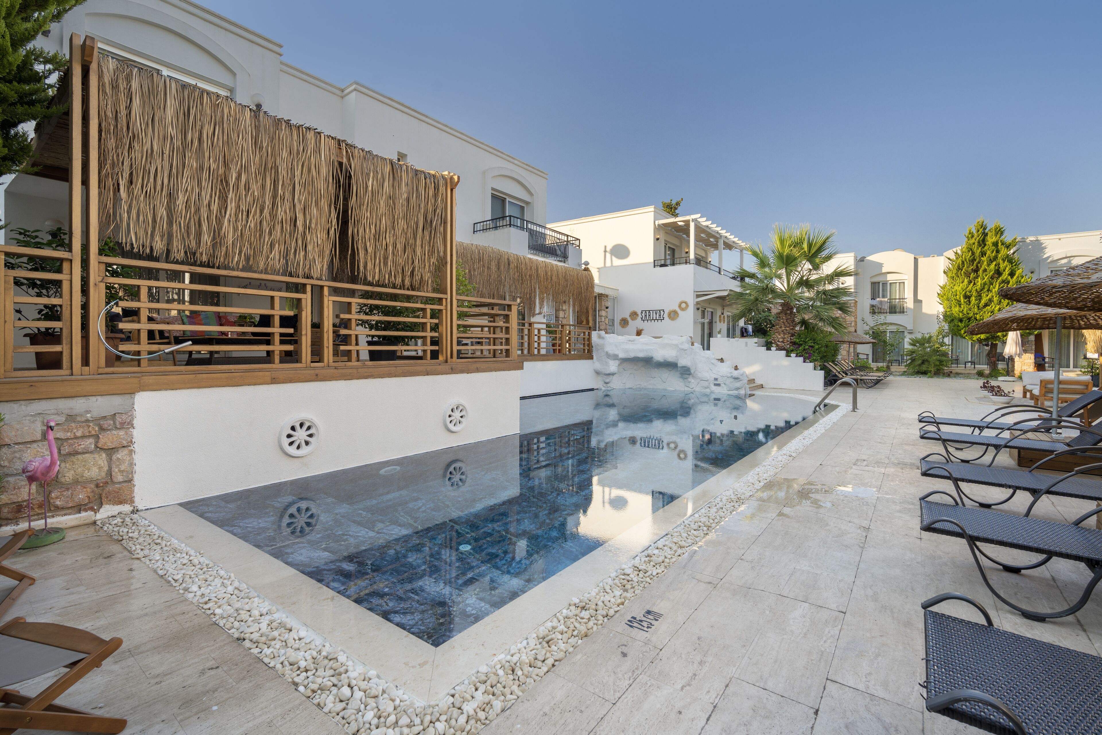 Outdoor pool, pool umbrellas, sun loungers
