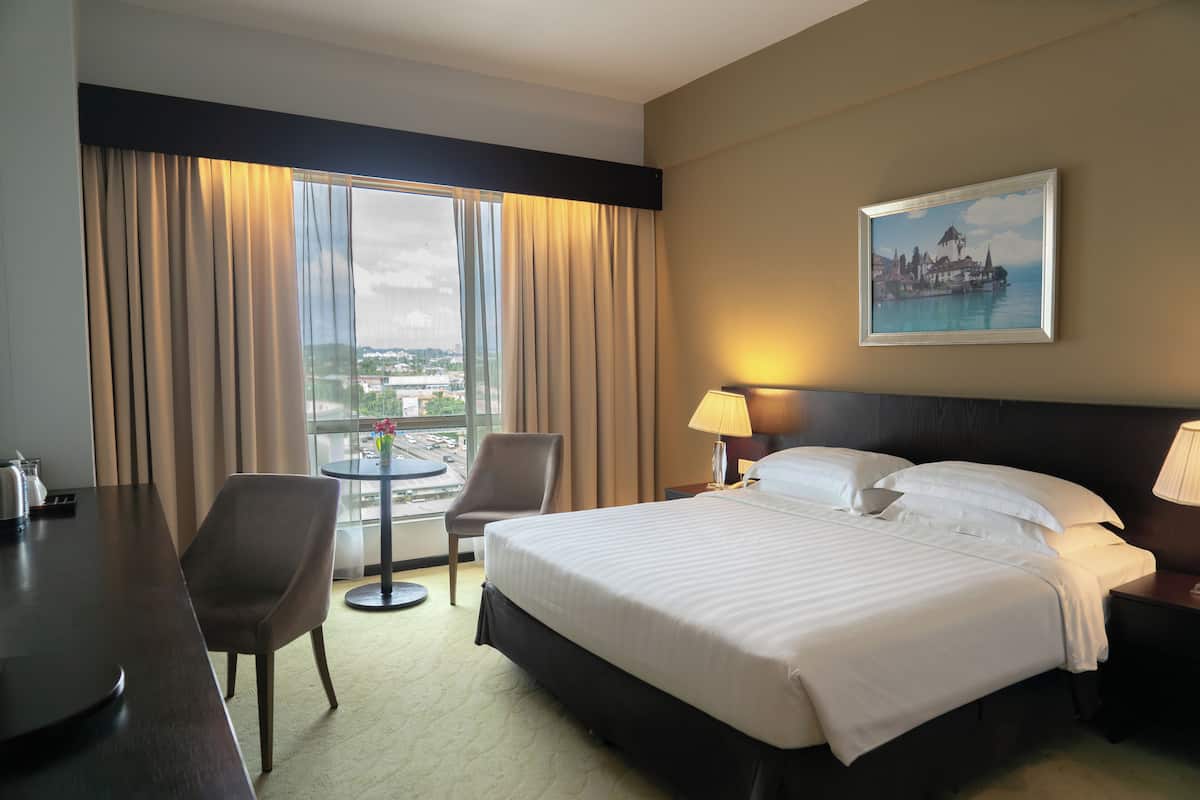 Family Suite Room | Minibar, in-room safe, desk, laptop workspace