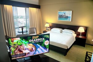 Family Suite Room | Minibar, in-room safe, desk, laptop workspace