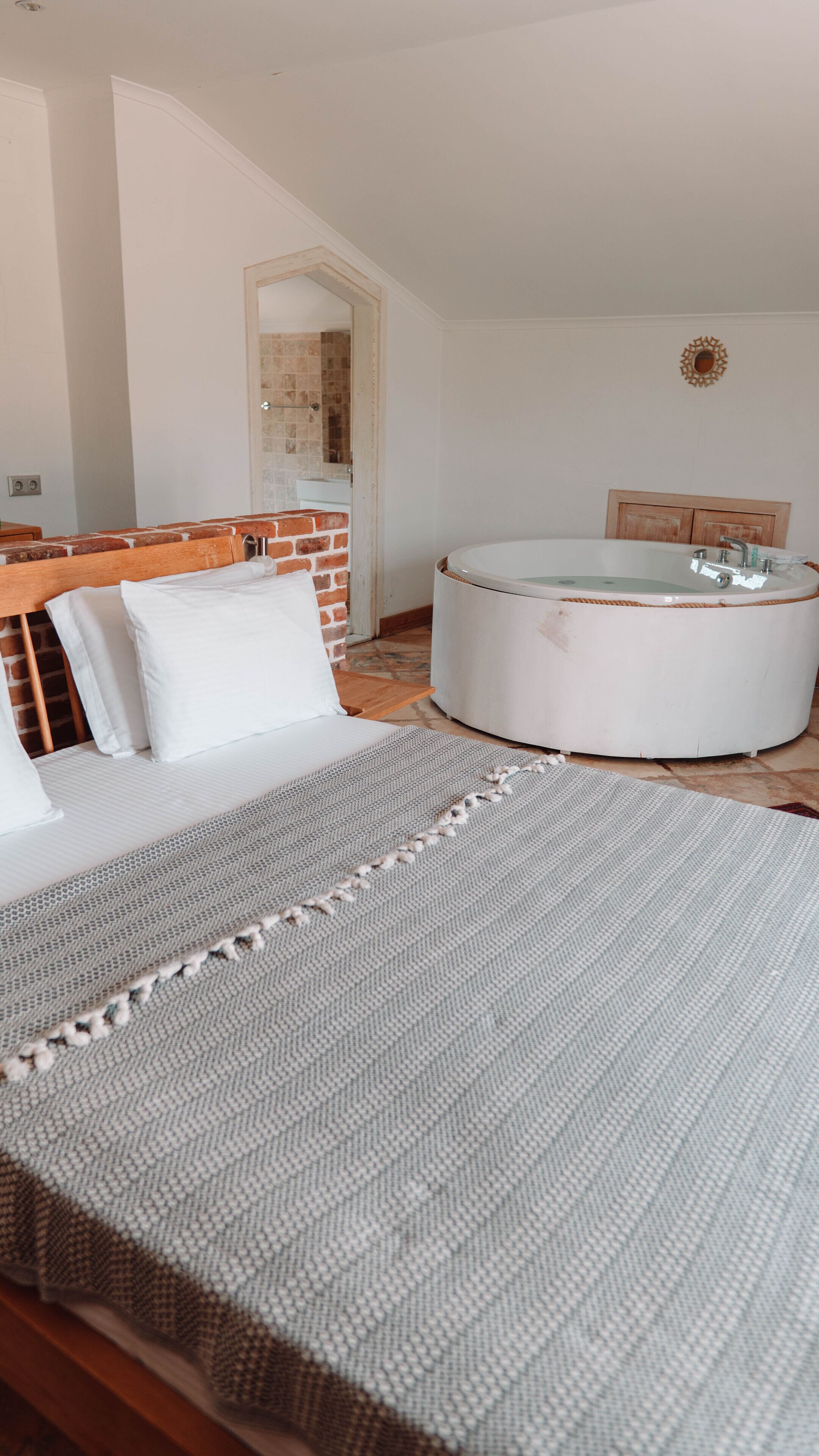 deluxe double room, pool view | premium bedding, minibar, desk, laptop workspace