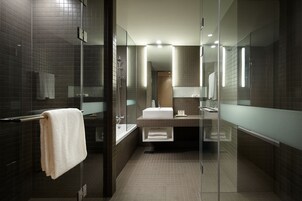 Designer toiletries, hair dryer, bathrobes, slippers