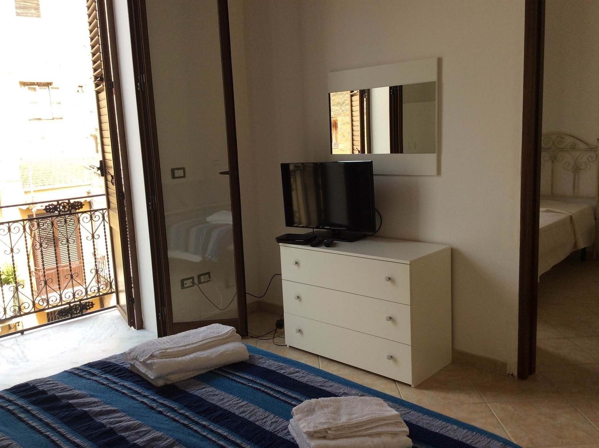 Chambre Quadruple Classique, 2 chambres | 1 chambre, literie de qualité supérieure, fer et planche à repasser