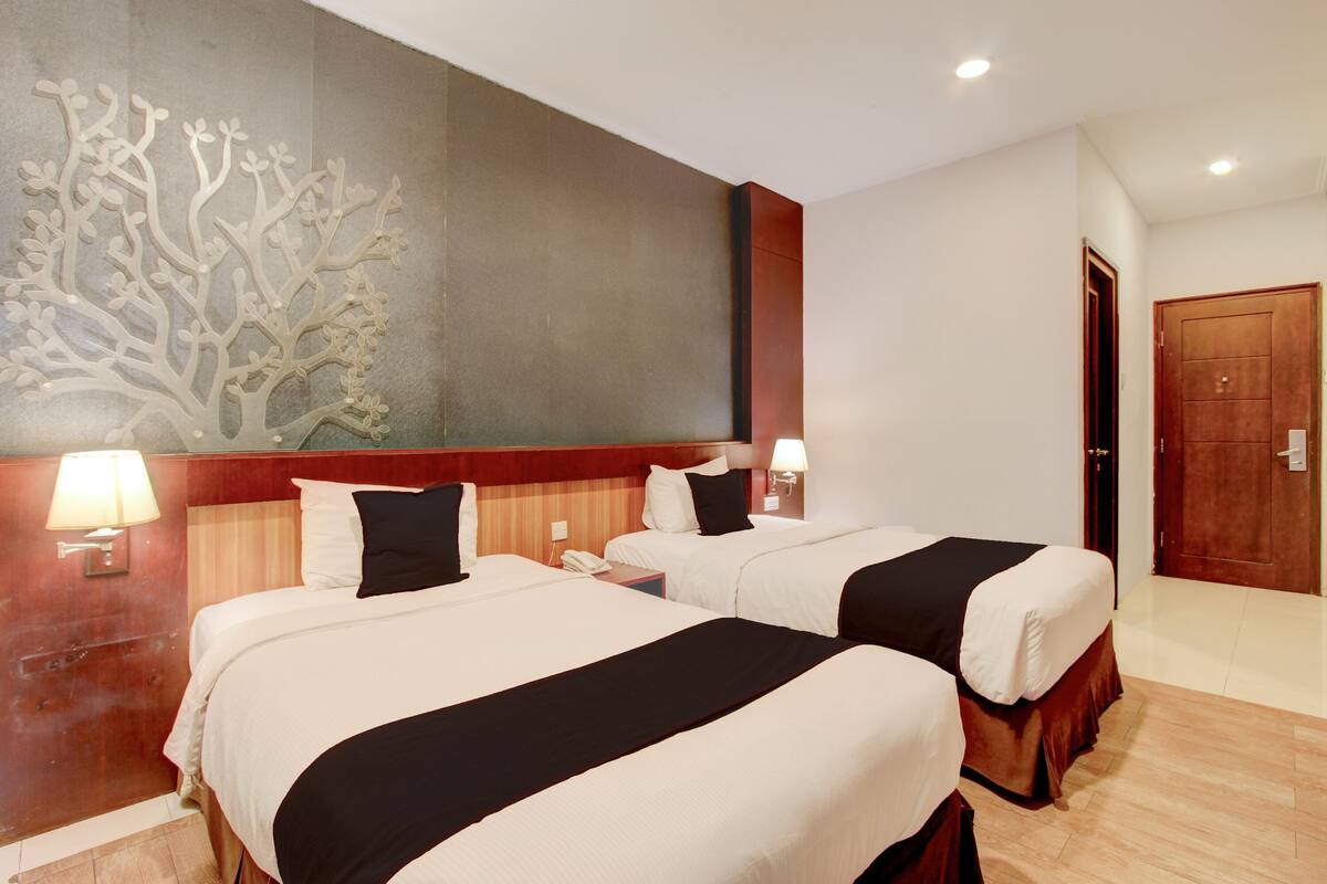 Habitación Deluxe con 2 camas individuales | Ropa de cama hipoalergénica, wifi gratis y ropa de cama